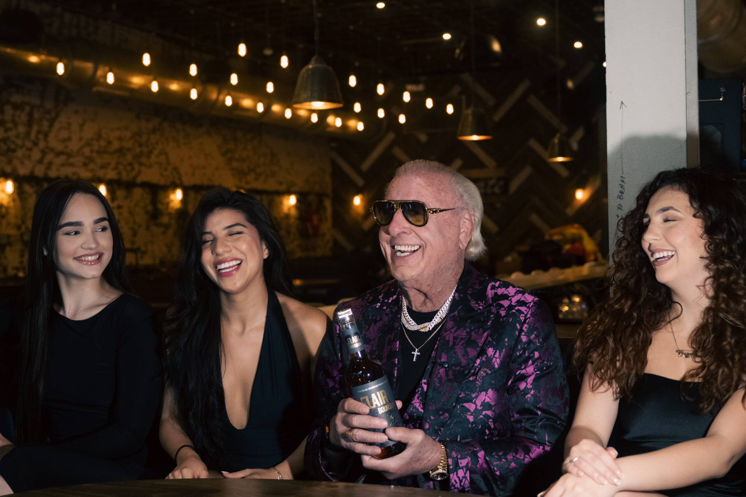 The Legendary Ric Flair poses with his signature spirits.